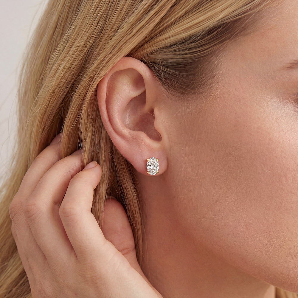 Puces Zirconia Ovale Doré – portées