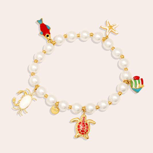 Bracelet Ocean Creatures Perles Nacrées – fond rosé vue complète