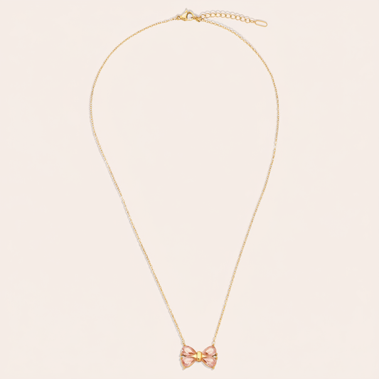Collier Nœud Rose sur fond beige sans médaillon doré